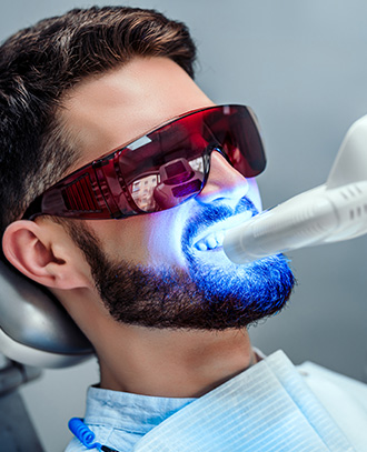 man getting teeth whitened