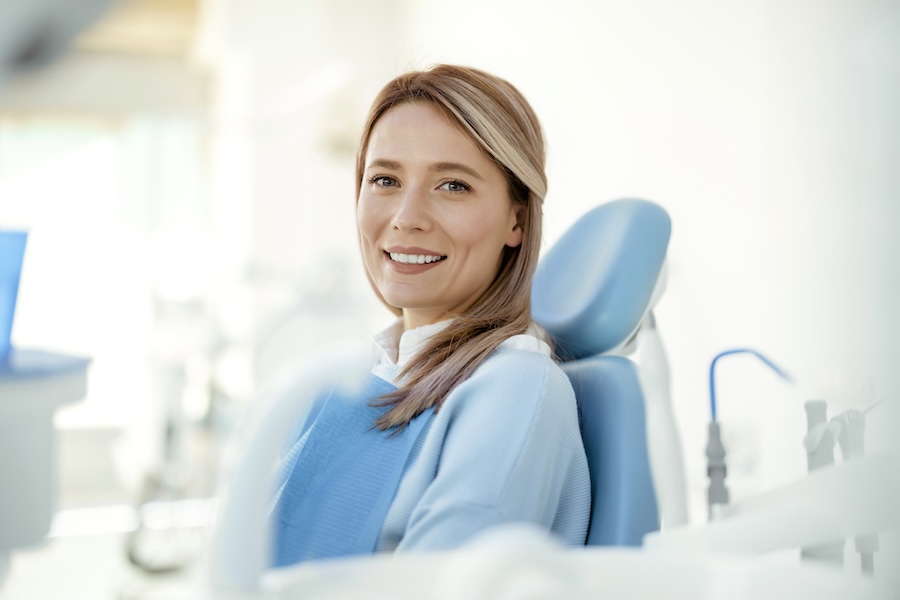 woman in dental chair for a dental cleaning