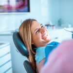 woman in dental chair for invisalign consultation